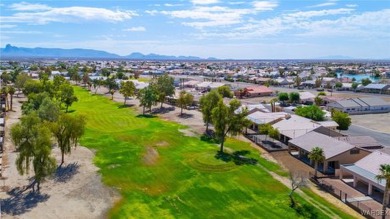 Welcome to your dream home in the coveted Desert Lakes community on Desert Lakes Golf Course in Arizona - for sale on GolfHomes.com, golf home, golf lot