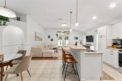 Welcome to this beautifully updated, low-maintenance home on Turkey Creek Golf and Country Club in Florida - for sale on GolfHomes.com, golf home, golf lot