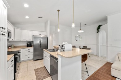 Welcome to this beautifully updated, low-maintenance home on Turkey Creek Golf and Country Club in Florida - for sale on GolfHomes.com, golf home, golf lot