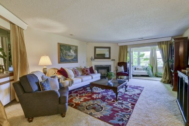 Elegant condominium with GARAGE in well established gated on Pointe Royale Village Country Club in Missouri - for sale on GolfHomes.com, golf home, golf lot