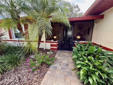 You'll truly have it *made in the shade* in this gorgeous condo on Falcon Watch Golf Club in Florida - for sale on GolfHomes.com, golf home, golf lot