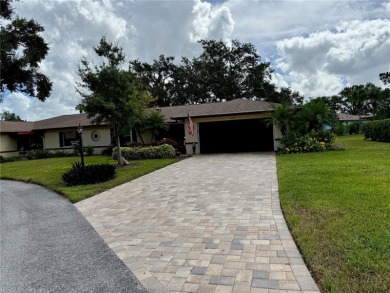 You'll truly have it *made in the shade* in this gorgeous condo on Falcon Watch Golf Club in Florida - for sale on GolfHomes.com, golf home, golf lot