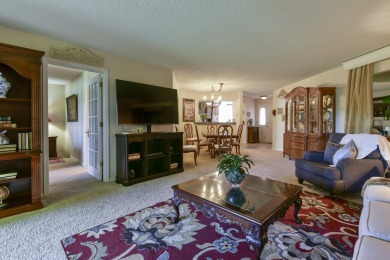 Elegant condominium with GARAGE in well established gated on Pointe Royale Village Country Club in Missouri - for sale on GolfHomes.com, golf home, golf lot