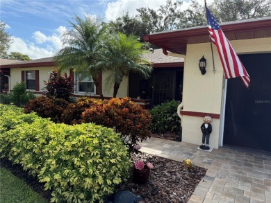You'll truly have it *made in the shade* in this gorgeous condo on Falcon Watch Golf Club in Florida - for sale on GolfHomes.com, golf home, golf lot