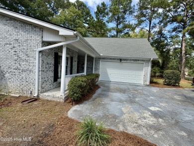 Discover Coastal Paradise at 14 Bayberry Court, Carolina Shores on Carolina Shores Golf Course in North Carolina - for sale on GolfHomes.com, golf home, golf lot