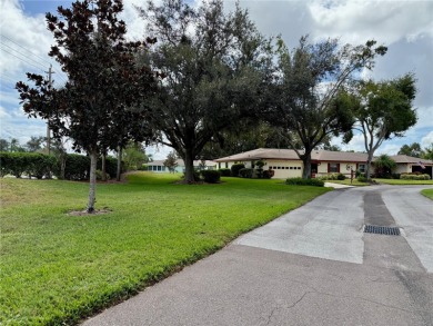 You'll truly have it *made in the shade* in this gorgeous condo on Falcon Watch Golf Club in Florida - for sale on GolfHomes.com, golf home, golf lot