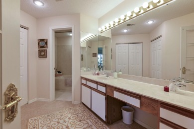 Elegant condominium with GARAGE in well established gated on Pointe Royale Village Country Club in Missouri - for sale on GolfHomes.com, golf home, golf lot