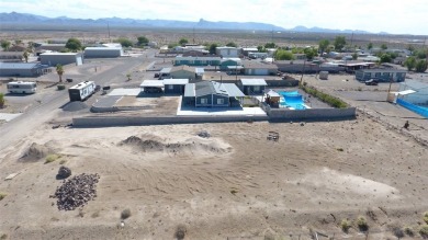 Discover the perfect spot to put a manufactured home or build on Los Lagos Golf Club in Arizona - for sale on GolfHomes.com, golf home, golf lot