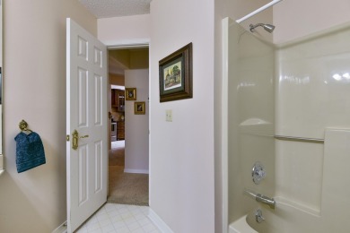 Elegant condominium with GARAGE in well established gated on Pointe Royale Village Country Club in Missouri - for sale on GolfHomes.com, golf home, golf lot