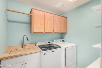 This beautifully maintained single-level 3 bed, 2 bath home sits on Sunland Springs Golf Course  in Arizona - for sale on GolfHomes.com, golf home, golf lot