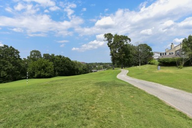 Elegant condominium with GARAGE in well established gated on Pointe Royale Village Country Club in Missouri - for sale on GolfHomes.com, golf home, golf lot