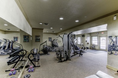 Elegant condominium with GARAGE in well established gated on Pointe Royale Village Country Club in Missouri - for sale on GolfHomes.com, golf home, golf lot