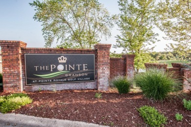 Elegant condominium with GARAGE in well established gated on Pointe Royale Village Country Club in Missouri - for sale on GolfHomes.com, golf home, golf lot