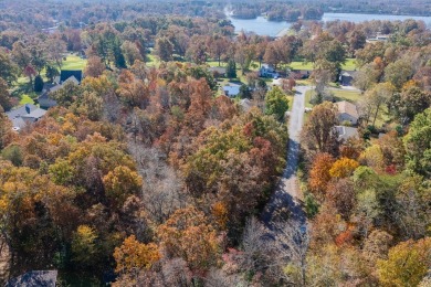 Discover an exceptional opportunity to build your dream home on on Lake Tansi Village Country Club in Tennessee - for sale on GolfHomes.com, golf home, golf lot