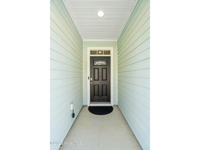 Welcome to this beautifully enhanced 3 bedroom, 2 bath, 1618 on Cape Fear National At Brunswick Forest in North Carolina - for sale on GolfHomes.com, golf home, golf lot