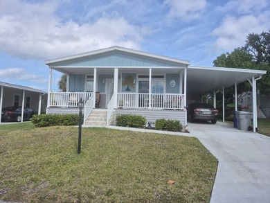 This is stunning and a must see, located in Beach Cove 55+ on Pelican Pointe 9 Hole Course in Florida - for sale on GolfHomes.com, golf home, golf lot