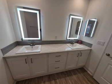 This is stunning and a must see, located in Beach Cove 55+ on Pelican Pointe 9 Hole Course in Florida - for sale on GolfHomes.com, golf home, golf lot