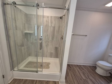 This is stunning and a must see, located in Beach Cove 55+ on Pelican Pointe 9 Hole Course in Florida - for sale on GolfHomes.com, golf home, golf lot