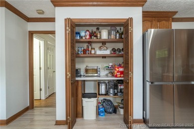 WELCOME TO THIS CHARMING TRADITIONAL 4BED/2.5BA HOME IN on Kings Grant Golf and Country Club in North Carolina - for sale on GolfHomes.com, golf home, golf lot