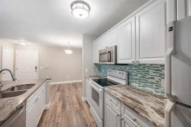 Welcome to Unit 903, a beautifully updated 1-bedroom, 1-bath on Hunters Green Country Club in Florida - for sale on GolfHomes.com, golf home, golf lot
