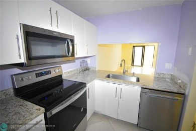 Retirement living at its finest! This stunning, updated 2/2 unit on Sunrise Lakes Phase IV Golf Course in Florida - for sale on GolfHomes.com, golf home, golf lot