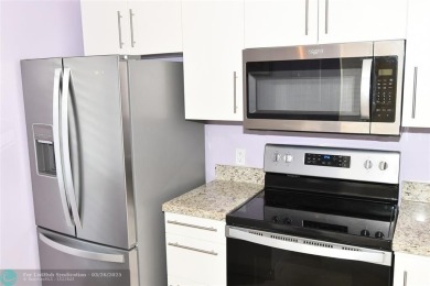 Retirement living at its finest! This stunning, updated 2/2 unit on Sunrise Lakes Phase IV Golf Course in Florida - for sale on GolfHomes.com, golf home, golf lot