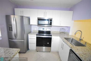 Retirement living at its finest! This stunning, updated 2/2 unit on Sunrise Lakes Phase IV Golf Course in Florida - for sale on GolfHomes.com, golf home, golf lot