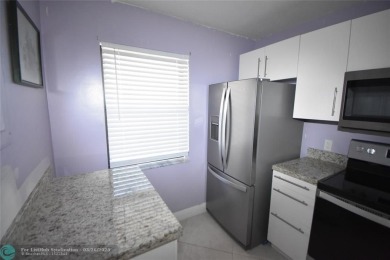 Retirement living at its finest! This stunning, updated 2/2 unit on Sunrise Lakes Phase IV Golf Course in Florida - for sale on GolfHomes.com, golf home, golf lot