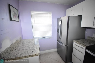 Retirement living at its finest! This stunning, updated 2/2 unit on Sunrise Lakes Phase IV Golf Course in Florida - for sale on GolfHomes.com, golf home, golf lot