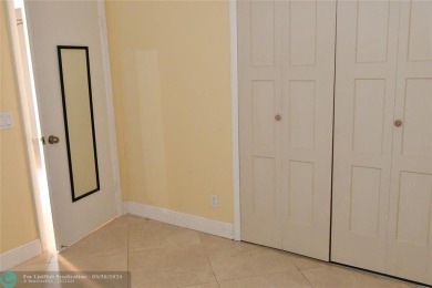Retirement living at its finest! This stunning, updated 2/2 unit on Sunrise Lakes Phase IV Golf Course in Florida - for sale on GolfHomes.com, golf home, golf lot