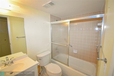 Retirement living at its finest! This stunning, updated 2/2 unit on Sunrise Lakes Phase IV Golf Course in Florida - for sale on GolfHomes.com, golf home, golf lot