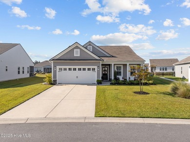 Contemporary coastal elegance defines this nearly new Eagle Run on Crow Creek Golf Club in North Carolina - for sale on GolfHomes.com, golf home, golf lot