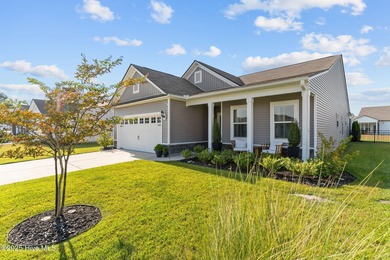 Contemporary coastal elegance defines this nearly new Eagle Run on Crow Creek Golf Club in North Carolina - for sale on GolfHomes.com, golf home, golf lot