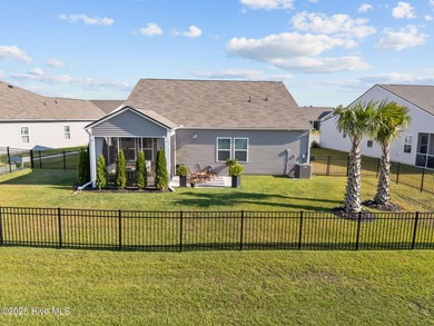 Contemporary coastal elegance defines this nearly new Eagle Run on Crow Creek Golf Club in North Carolina - for sale on GolfHomes.com, golf home, golf lot