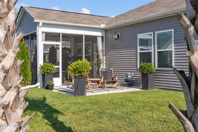 Contemporary coastal elegance defines this nearly new Eagle Run on Crow Creek Golf Club in North Carolina - for sale on GolfHomes.com, golf home, golf lot