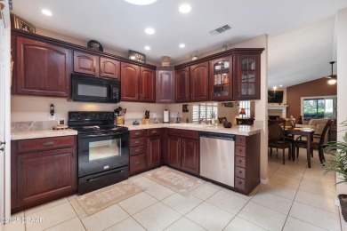 Beautiful golf course home on an oversized lot in the on Plantation Bay Golf and Country Club in Florida - for sale on GolfHomes.com, golf home, golf lot