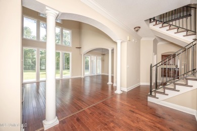 Welcome to your executive four-bedroom grand home located on the on The Oaks Golf Club in Mississippi - for sale on GolfHomes.com, golf home, golf lot