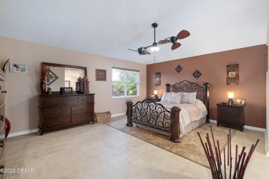 Beautiful golf course home on an oversized lot in the on Plantation Bay Golf and Country Club in Florida - for sale on GolfHomes.com, golf home, golf lot