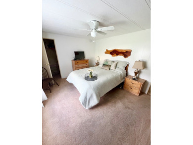 This beautiful two-bedroom, two-bath home is located in the on Pine Lakes Country Club in Florida - for sale on GolfHomes.com, golf home, golf lot