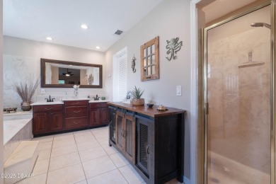 Beautiful golf course home on an oversized lot in the on Plantation Bay Golf and Country Club in Florida - for sale on GolfHomes.com, golf home, golf lot
