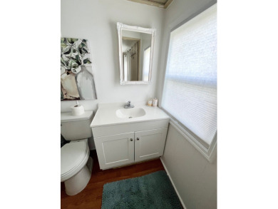 This beautiful two-bedroom, two-bath home is located in the on Pine Lakes Country Club in Florida - for sale on GolfHomes.com, golf home, golf lot