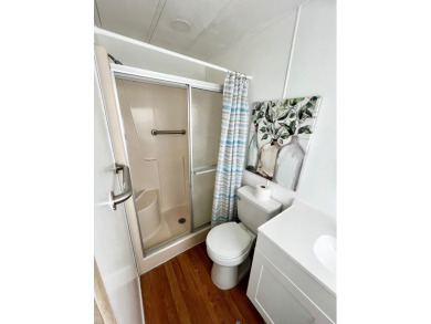 This beautiful two-bedroom, two-bath home is located in the on Pine Lakes Country Club in Florida - for sale on GolfHomes.com, golf home, golf lot