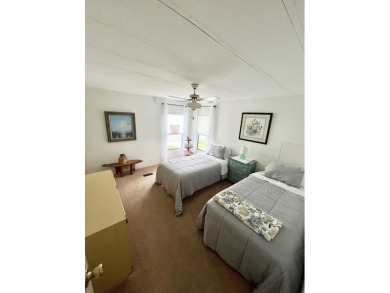 This beautiful two-bedroom, two-bath home is located in the on Pine Lakes Country Club in Florida - for sale on GolfHomes.com, golf home, golf lot