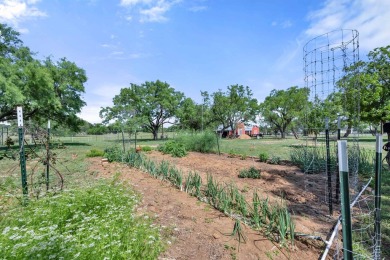 This rare 4-bedroom, single-story home is situated on nearly one on Llano River Golf Course in Texas - for sale on GolfHomes.com, golf home, golf lot