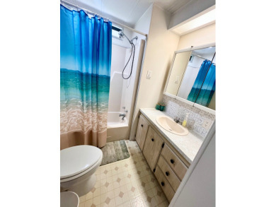 This beautiful two-bedroom, two-bath home is located in the on Pine Lakes Country Club in Florida - for sale on GolfHomes.com, golf home, golf lot