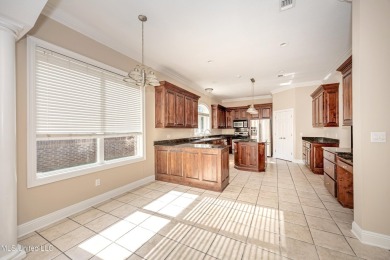 Welcome to your executive four-bedroom grand home located on the on The Oaks Golf Club in Mississippi - for sale on GolfHomes.com, golf home, golf lot