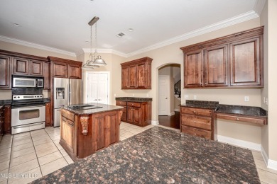 Welcome to your executive four-bedroom grand home located on the on The Oaks Golf Club in Mississippi - for sale on GolfHomes.com, golf home, golf lot