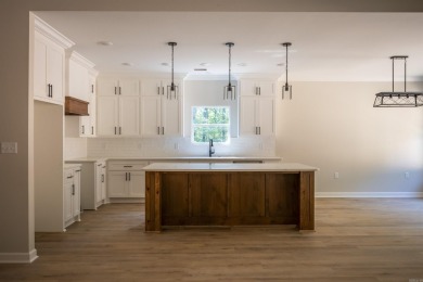 This stunning 5-bedroom, 3-bath brick home offers modern design on The Course At Eagle Mountain in Arkansas - for sale on GolfHomes.com, golf home, golf lot