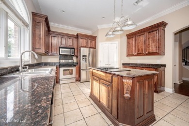 Welcome to your executive four-bedroom grand home located on the on The Oaks Golf Club in Mississippi - for sale on GolfHomes.com, golf home, golf lot