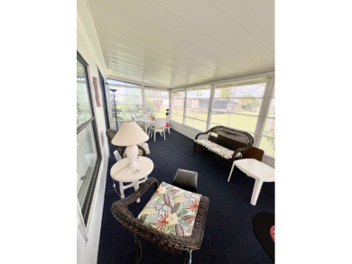 This beautiful two-bedroom, two-bath home is located in the on Pine Lakes Country Club in Florida - for sale on GolfHomes.com, golf home, golf lot